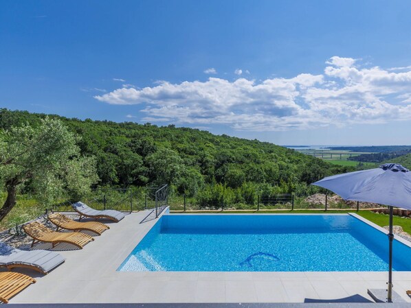 Water, Sky, Cloud, Property, Swimming Pool, Blue, Azure, Building, Outdoor Furniture, Rectangle
