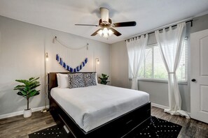 Primary bedroom with queen bed