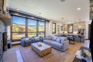 Spacious and bright luxury living area offering mountain views!