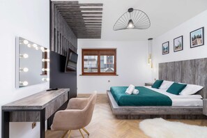 The bedroom features a luxurious double bed for a restful night's sleep. 