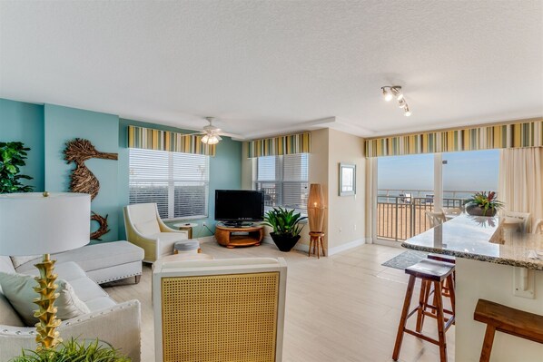 Spacious, comfortable ocean front living area with ample seating