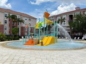 Water playground for the kids, at the pool area right outside our condo