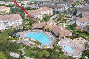 Main pool area right outside, with free to use jacuzzi, large pool and kids pool