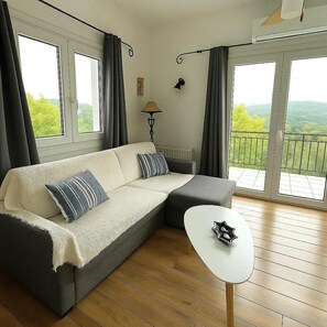 A couch to enjoy the green view from