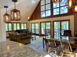 Spacious living room with 180° stunning lake views