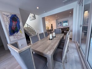 Dining table expands extra chairs in garage, 