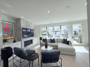 Living Room with doors opening up completely indoor outdoor living