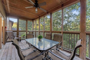 Enjoy some meals or a morning cup of coffee on the screened in back porch!
