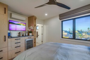 2nd suite with AC/Heat, entertainment center, frig, auto roman shades and view