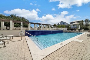 Dive into vacation mode with a refreshing swim in the beautiful community pool oasis.