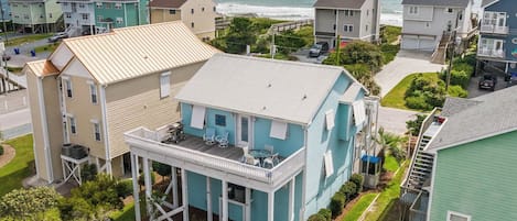Ideally located, "Surf Landing" has 5 bedrooms, 3 decks, ocean and intracoastal views + views of the Surf City Bridge, and beach access just across the street.