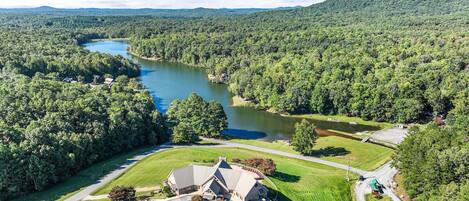 Breathtaking view of the clubhouse and lake.