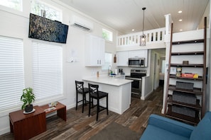 Full  kitchen, featuring stainless steel appliances.