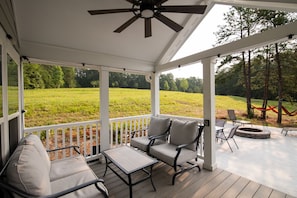 Covered porch seating area.