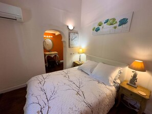 Main bedroom with adjacent dressing area