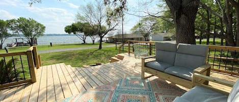 Enjoy the gorgeous lake views on the spacious deck