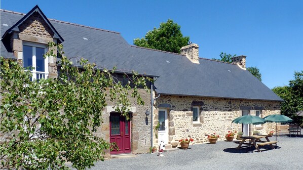 The front of the house, south facing so gets the sun all day. Not overlooked