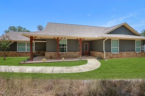Paved sidewalk directly from the parking area to the front porch