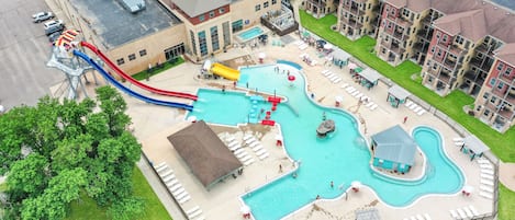 6 free daily passes to the indoor and outdoor waterpark. Hot tub, slides, bar. 