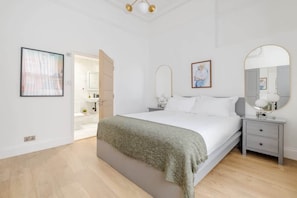 Bedroom 1: Ensuite with king bed, A/C & optional single bed on request.