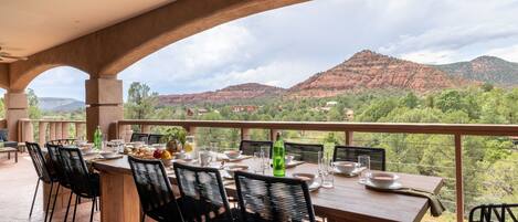 Dine al fresco while looking towards Pyramid Mountain.