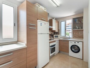 Cabinetry, Countertop, Furniture, Kitchen, Kitchen Appliance, Home Appliance, Building, Wood, Interior Design, Kitchen Stove
