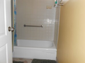 Bathtub with rail.