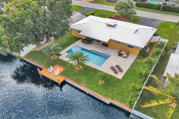 Palm Breeze Waterfront Oasis - Backyard & Canal Aerial View