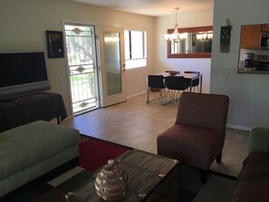 View of club house and pool area through front door