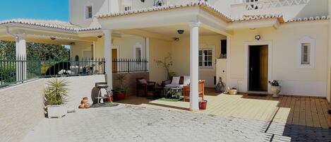 Front View of the House - Private parking and seating / bbq area