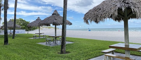 Take advantage of our many amenities like beachside tiki-styled picnic tables!