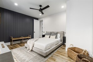 Queen Bed with large walk in closet,  Foosball table and a Smart TV