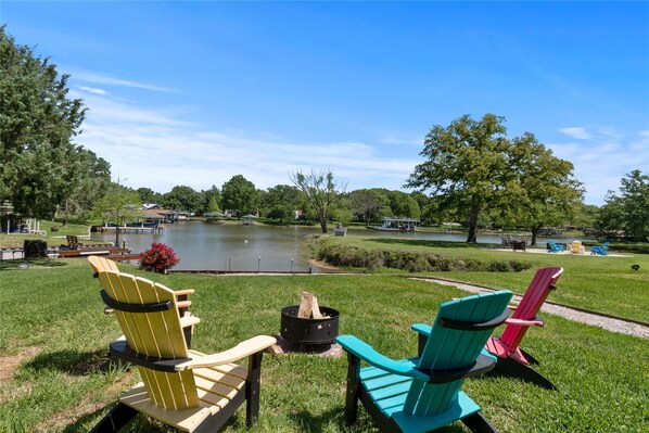 Seats with a waterfront view, cozy fire pit and relaxing vibe. 