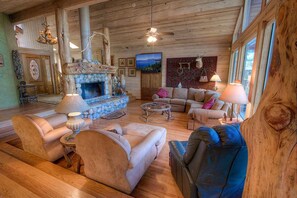 Main living area with wood burning fireplace