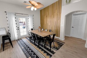 Dining area seats eight (8) comfortably