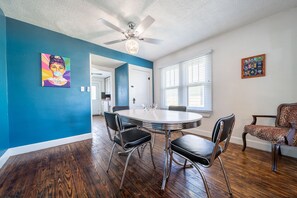 Dining room table seats 4 plus 2 extra stools included to seat 6. 