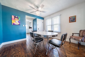Dining room table seats 4 plus 2 extra stools included to seat 6.
