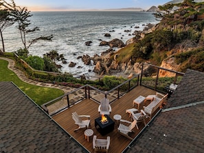 Expansive balcony - private backyard featuring a fire table and panoramic views