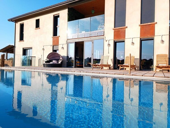 Heated infinity salt water pool with stunning views