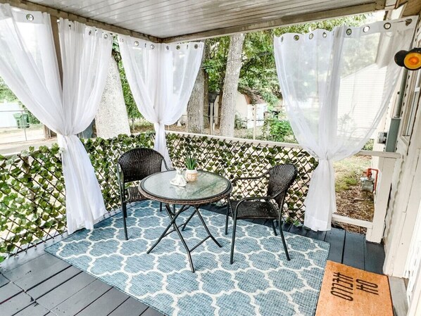 Outdoor living space with grill