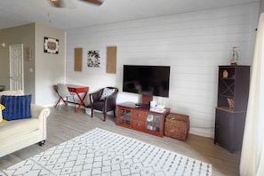 Living room with flatscreen television.