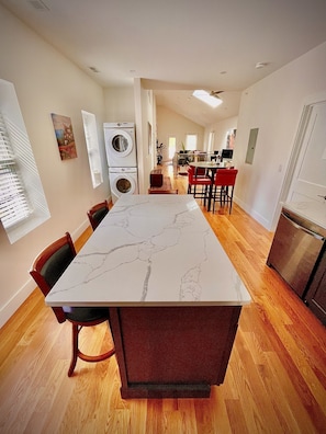 Kitchen area with washer and dryer
