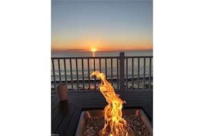 Relax by the firepit while staring out at the bay. Talk about pure bliss...