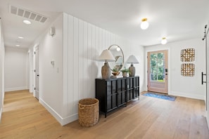 Entry way looking towards front door and hallway to bedroom 1,2 & 3