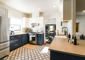 Newly remodeled kItchen with Bertazzoni appliances, farm style sink