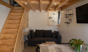 Kitchen opening onto living/dining room