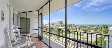 Relax on your penthouse top floor porch of sweeping water views. Sunsets nightly while you are tucked away to watch in the comfort of this coastal condo.