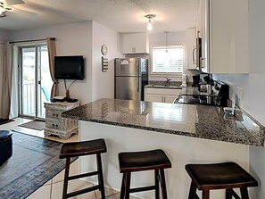 Bar Seating and Kitchen