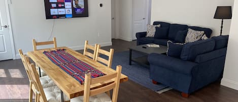 Dining & living room area - Roku flatscreen TV