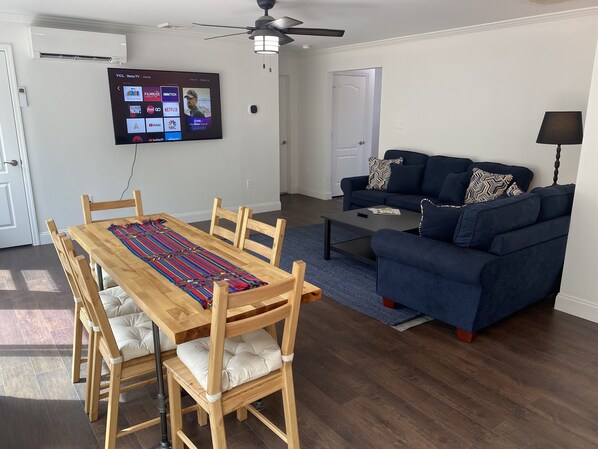 Dining & living room area - Roku flatscreen TV